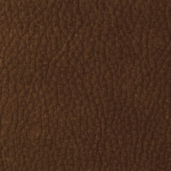 Dark brown leather texture with irregular raised bumps, matte finish, and subtle tonal variations suggesting a distressed, natural material.